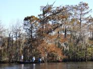 Fishermen in a boat on the river 